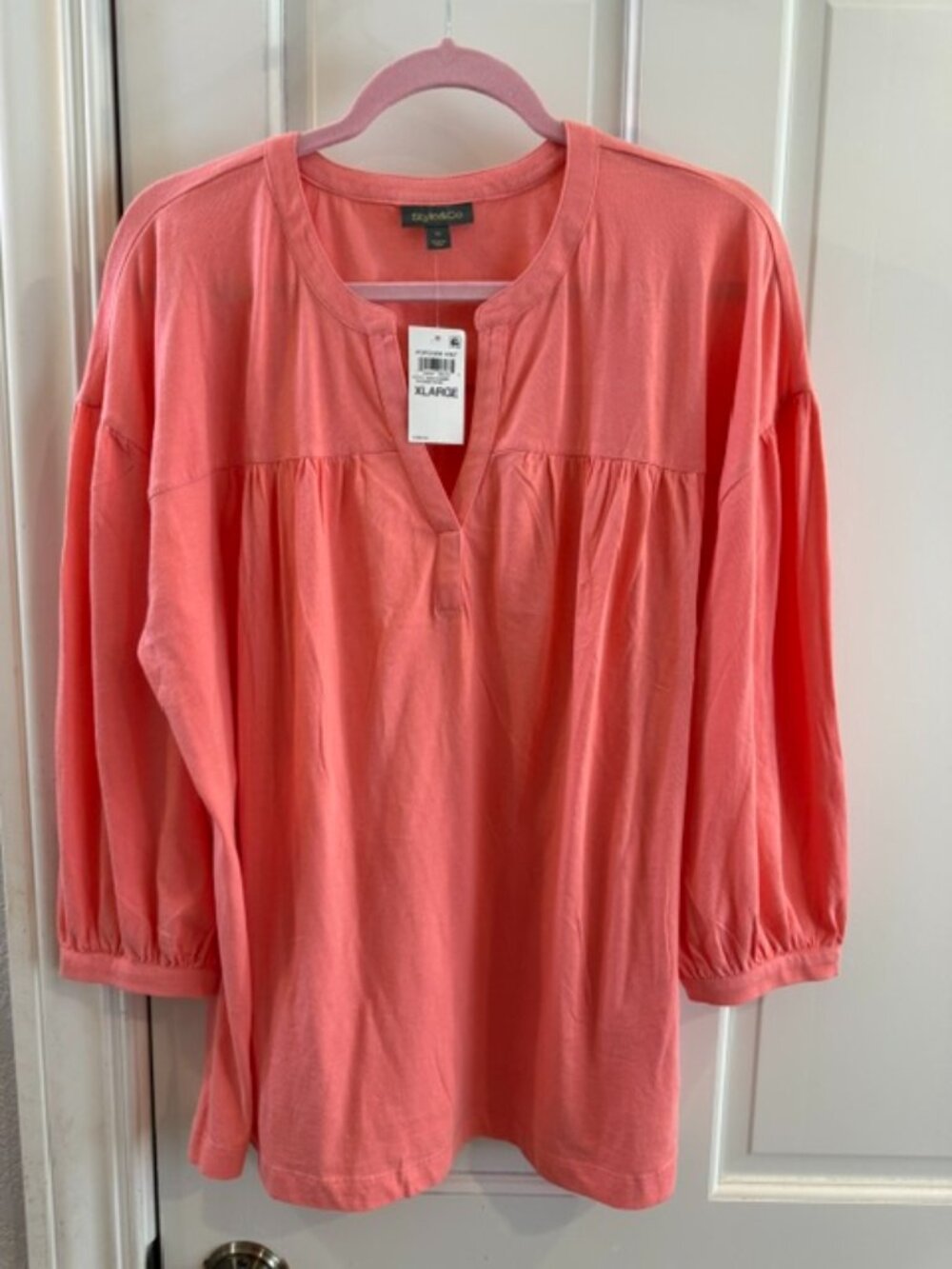 New with tags Style & Co. women's peasant top in a beautiful coral color.